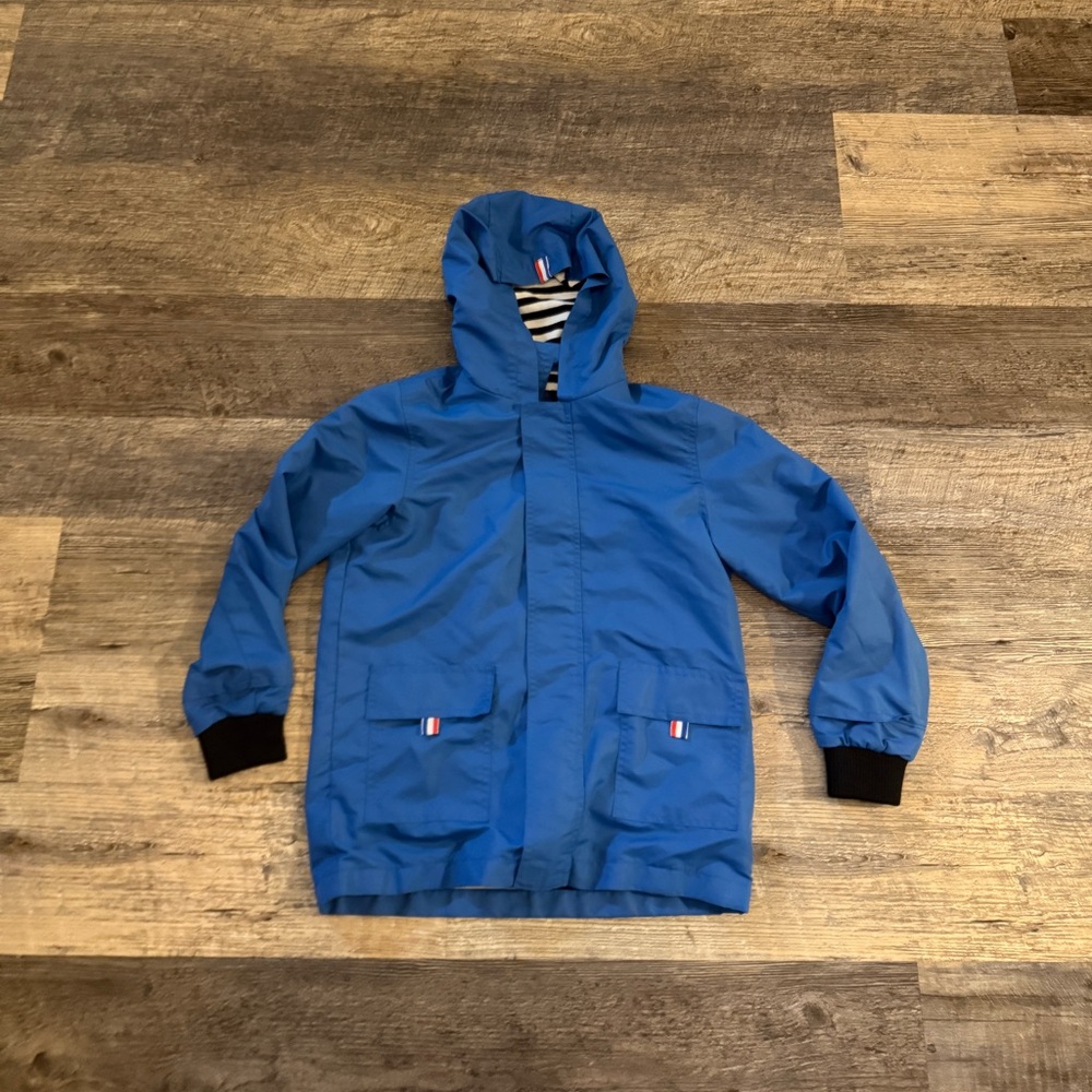 Blue Boys rain jacket. Worn a few times💙has pockets and hood size 130